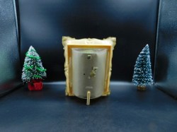 mini doll in frame green bk
